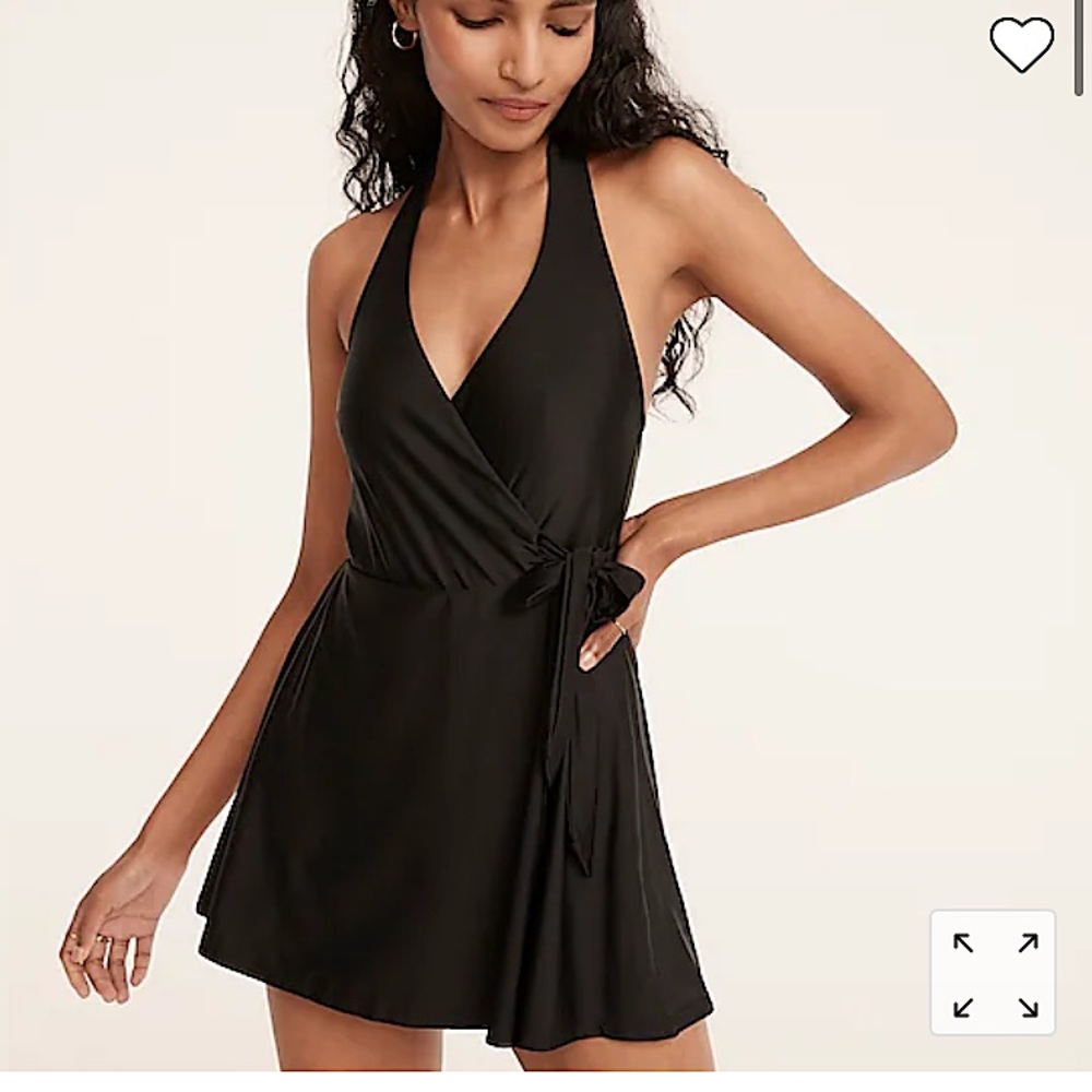 A swimsuit and a cover-up in one. With a flattering wrap and removable padding.